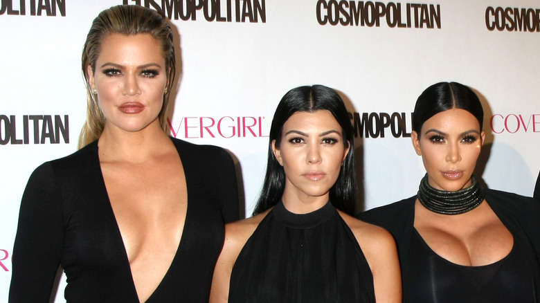 Kim Kardashian poses with sisters 