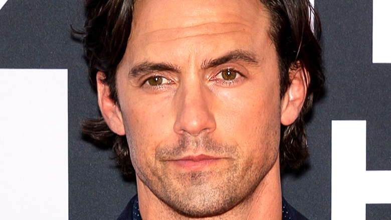 Milo Ventimiglia smirks on the red carpet