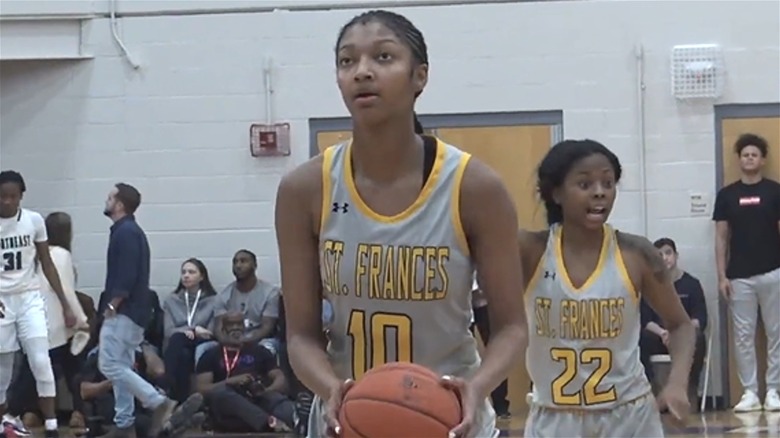 Angel Reese playing basketball at St. Frances Academy
