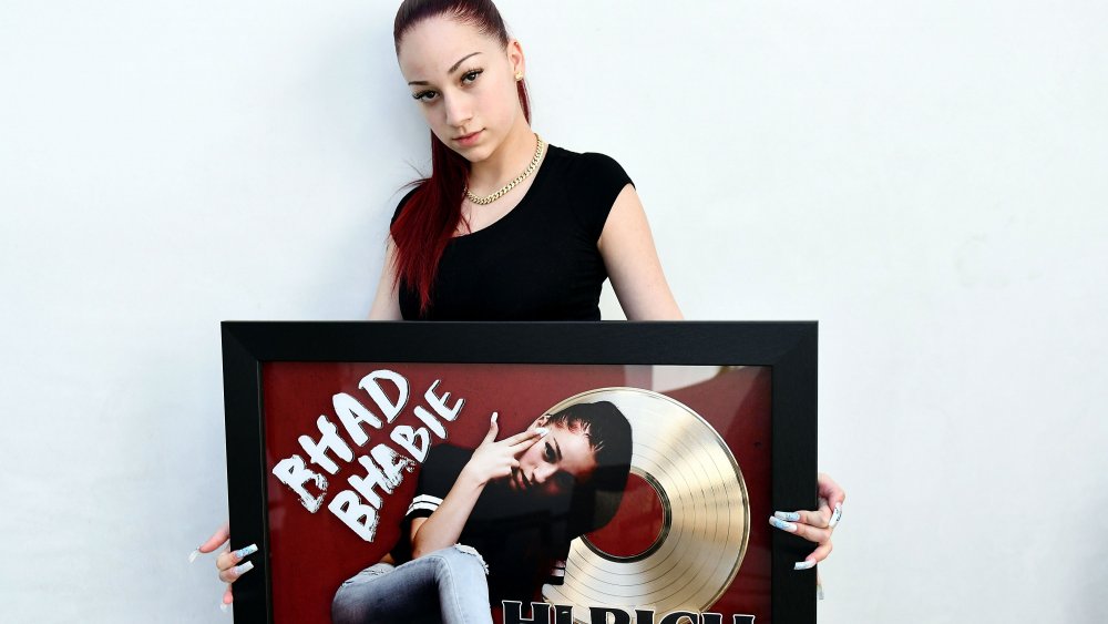 Bhad Bhabie holding her gold record 