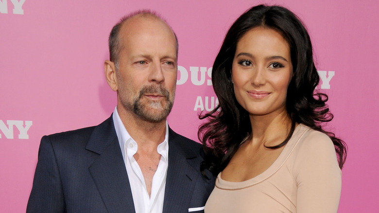 Bruce Willis and Emma Heming on a red carpet in 2008