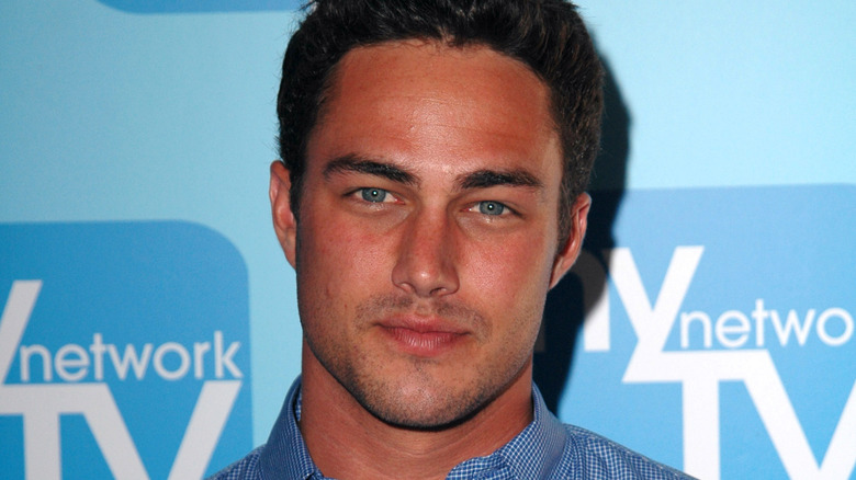 Taylor Kinney posing