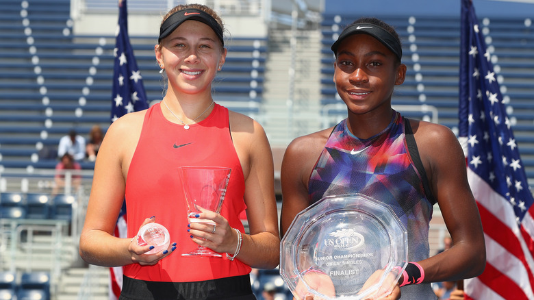 Amanda Anisimova and Coco Gauff posing with awards