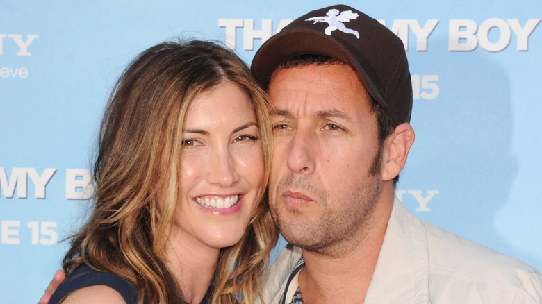 Jackie and Adam Sandler pressing faces together