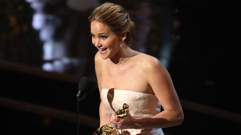 Jennifer Lawrence accepting her first Oscar