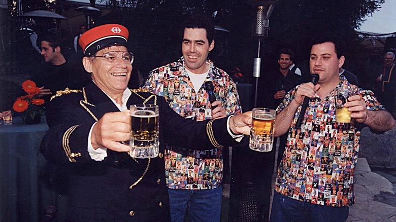 Bill Foster, Adam Carolla, Jimmy Kimmel cheering beers