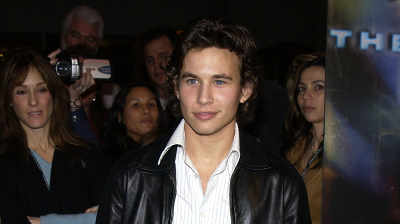 Jonathan Taylor Thomas posing for cameras