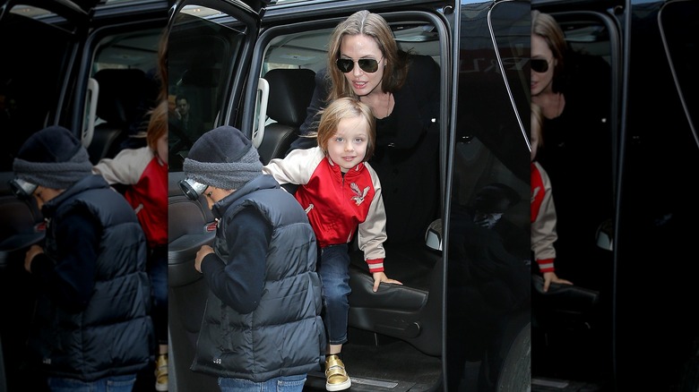 Knox Jolie-Pitt getting out of a car