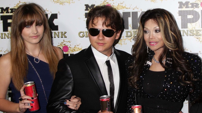 Prince with La Toya and Paris Jackson posing