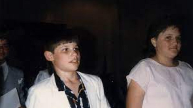 Young Nick Lachey in white suit