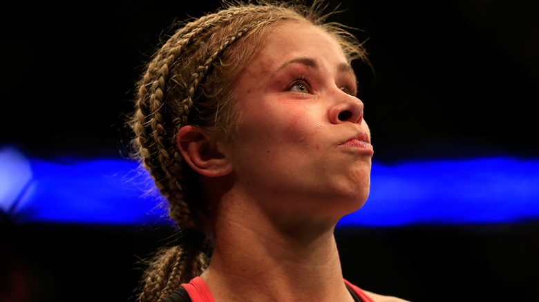 Paige VanZant in the ring with braids