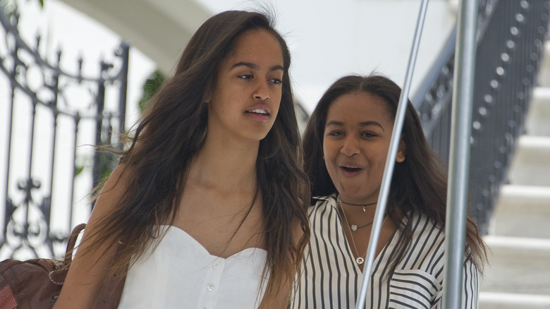 Malia and Sasha Obama traveling