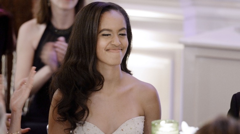 Malia Obama smiling at event