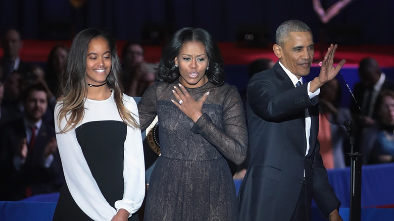 Malia, Michelle and Barack Obama