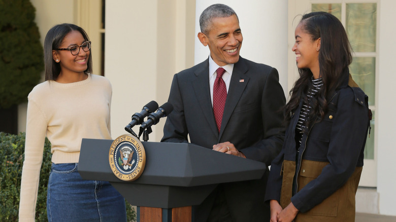 Sasha, Barack and Malia Obama