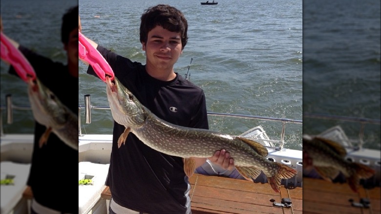 Frankie LaPenna shows fishing catch