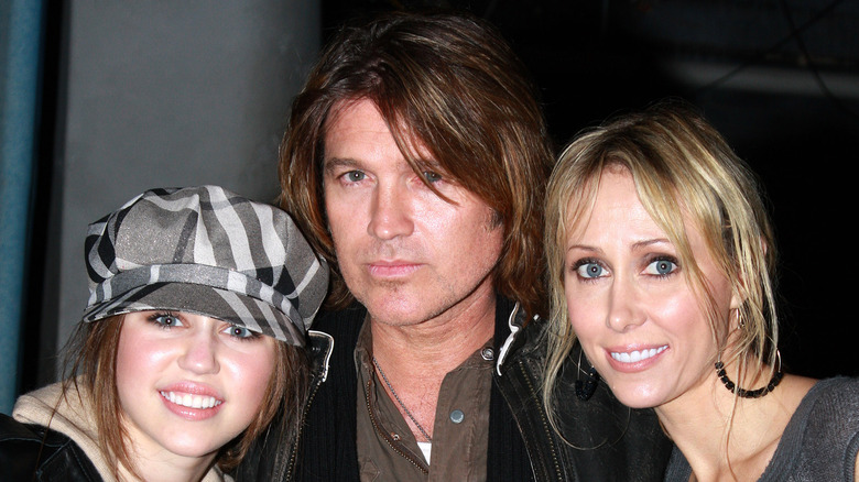 Miley, Billy Ray, and Tish Cyrus pose together at Mamma Mia! on Broadway