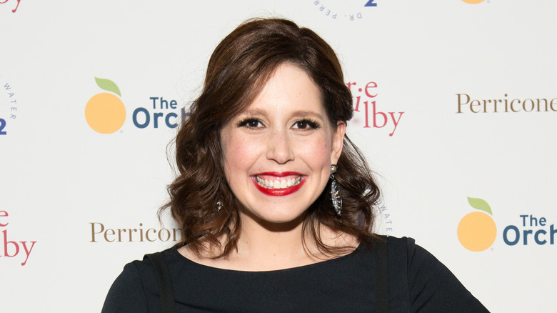 Vanessa Bayer wearing black top