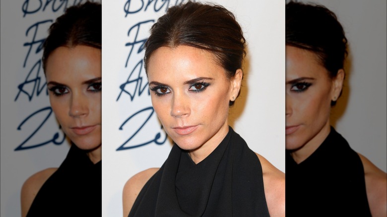 Victoria Beckham with her hair pulled back