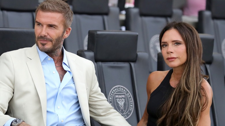 David and Victoria Beckham outside