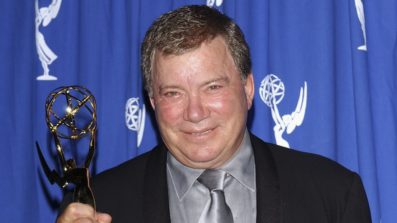 William Shatner smiling with his 2004 Emmy