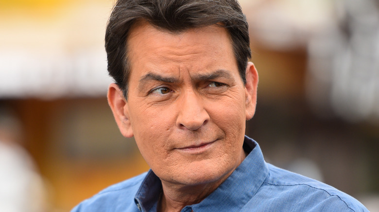 Charlie Sheen looking to the side