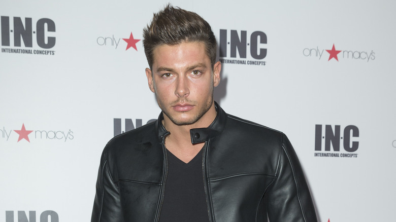 Andrea Denver poses at an event