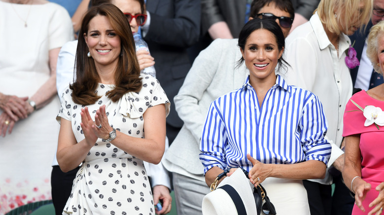 Kate Middleton and Meghan Markle smiling