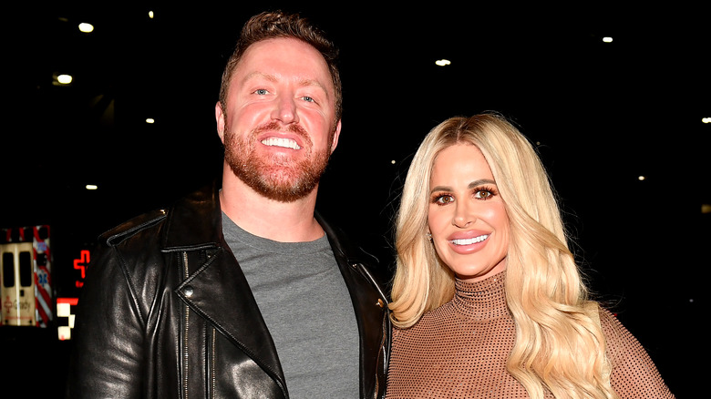 Kim Zolciak and Kroy Biermann pose 