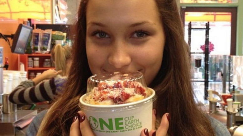 Bella Hadid holding acai bowl