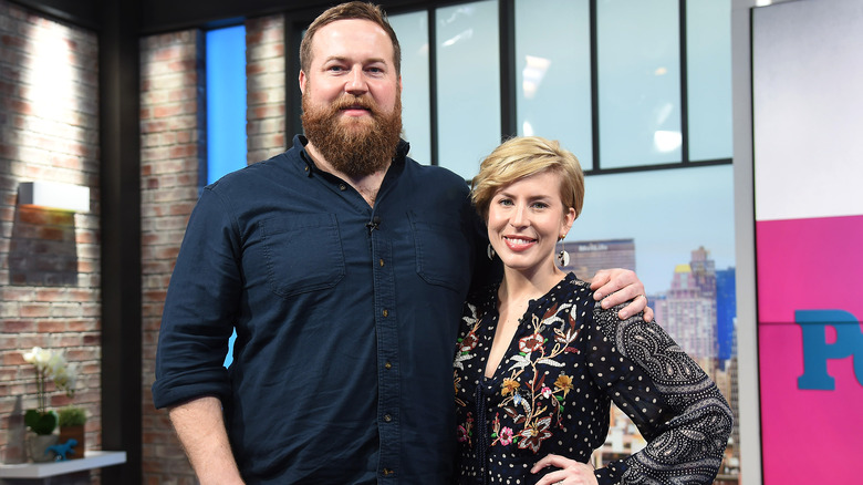 Ben and Erin Napier pose together 