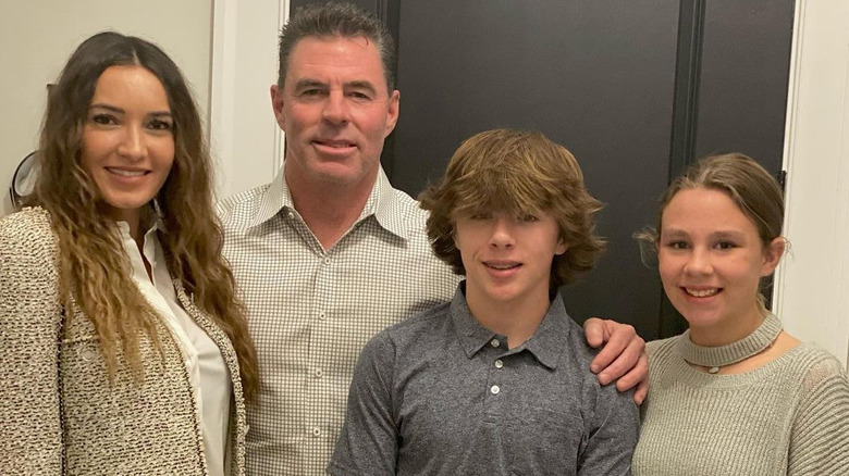 Jim Edmonds and Kortnie O'Connor posing with children 