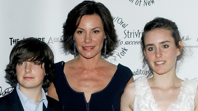 Luann De Lesseps posing with her children