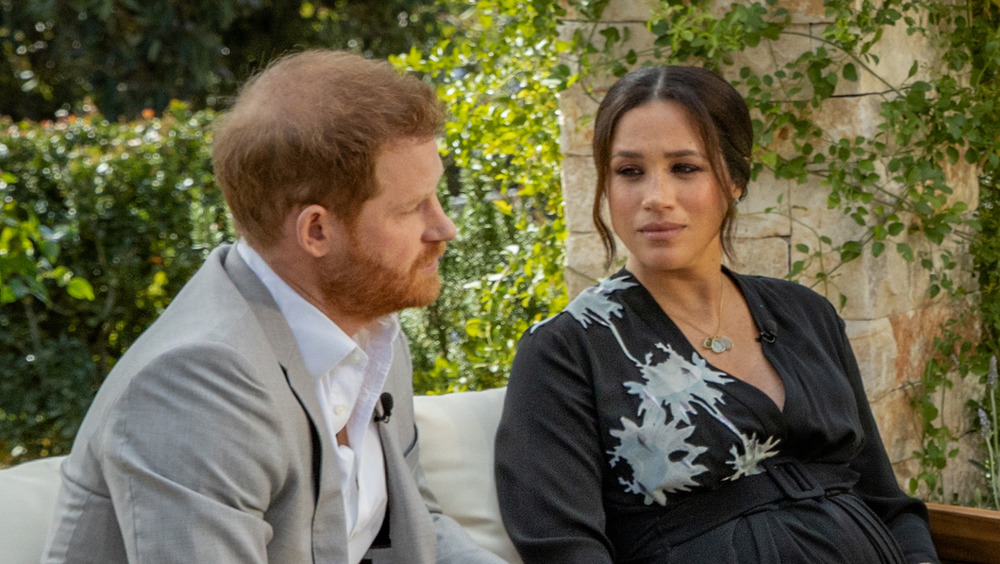 Prince Harry and Meghan Markle with Oprah Winfrey