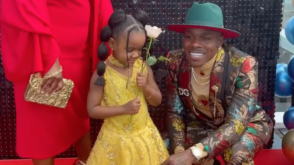 DaBaby poses with his daughter 