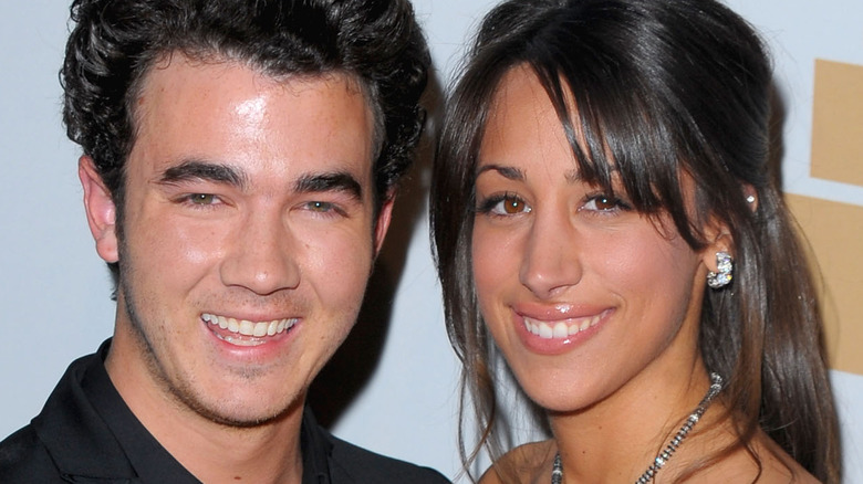 Kevin and Danielle Jonas young smiling 