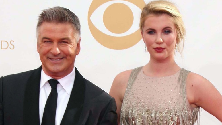 Alec Baldwin posing with daughter Ireland