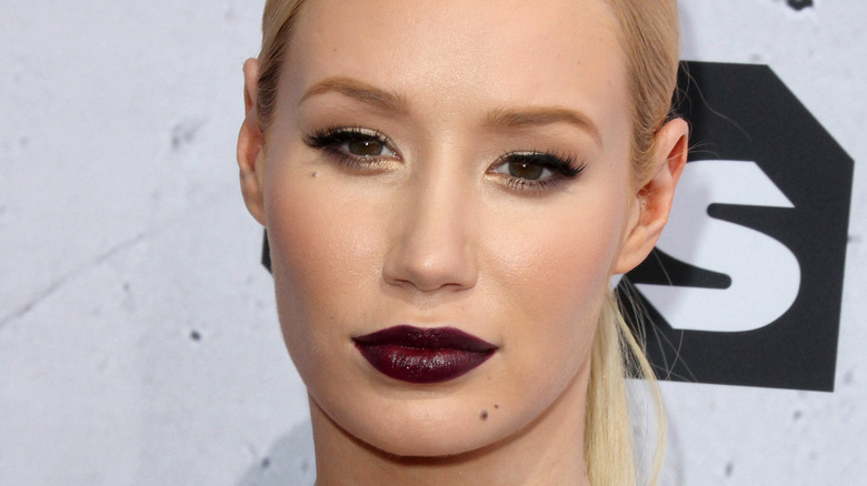 Iggy Azalea posing in dark lipstick