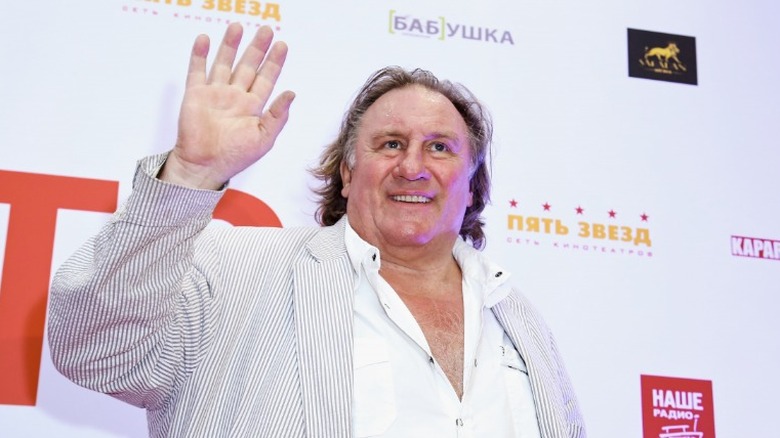 Gerard Depardieu waving hand 