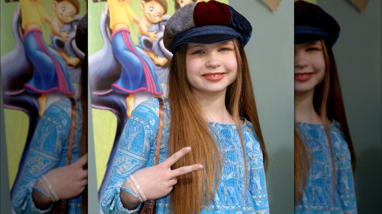 Daveigh Chase posing as a kid