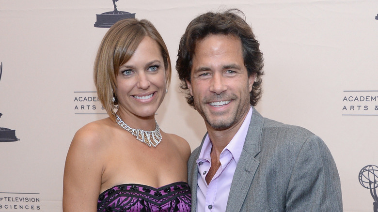 Arianne Zucker and Shawn Christian smilng