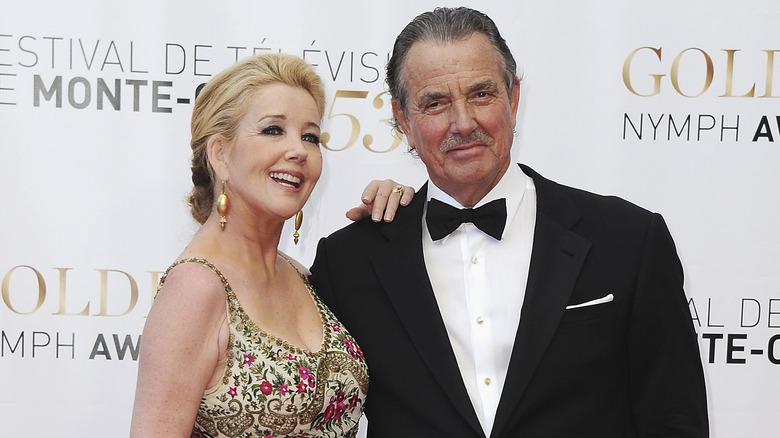 Melody Thomas Scott and Eric Braeden smiling