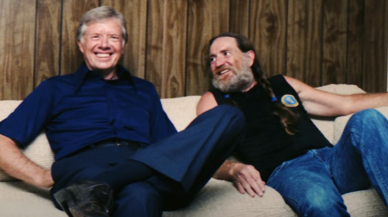 Jimmy Carter and Willie Nelson sit together