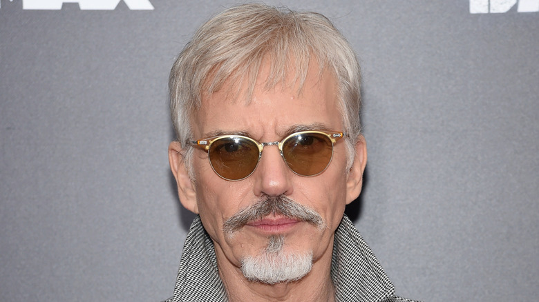 Billy Bob Thornton wearing tinted sunglasses on red carpet