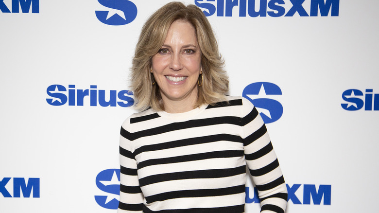 Alisyn Camerota posing at a SiriusXM event.