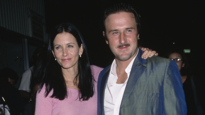 Courteney Cox and David Arquette posing and smiling