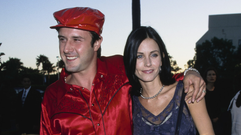 David Arquette and Courteney Cox posing and smiling