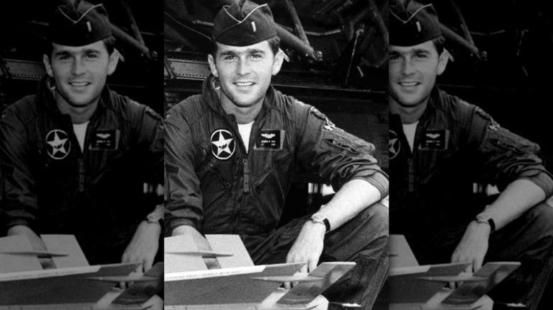 George W. Bush poses in military uniform