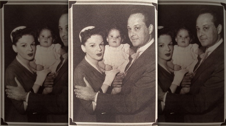 Judy Garland and Sid Luft hold their daughter Lorna