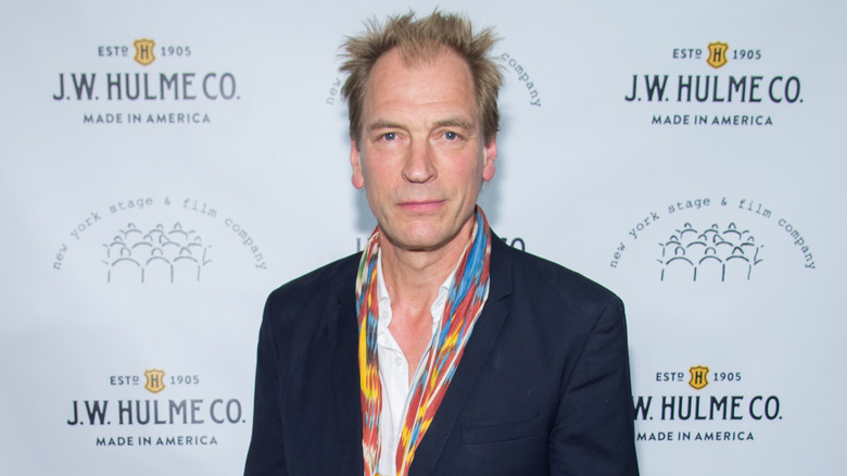 Julian Sands posing